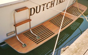 Close-up of a wooden deck on a boat named Dutch Tree.